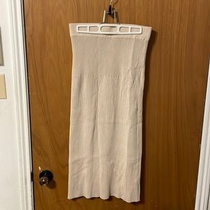 Midi length Beige skirt/No slits. Size M/fits like S. Stretchy Knit fabric.